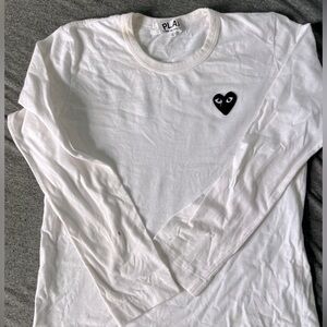 Play COMME DES GARCONS